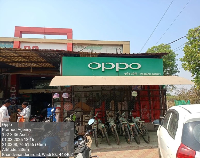 Before — non-lit green OPPO board, Pramod Agency, Wadi, Buldhana